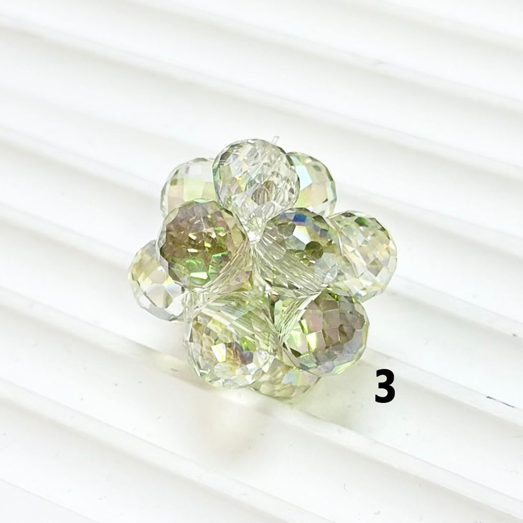 Clear faceted beads on a white background

