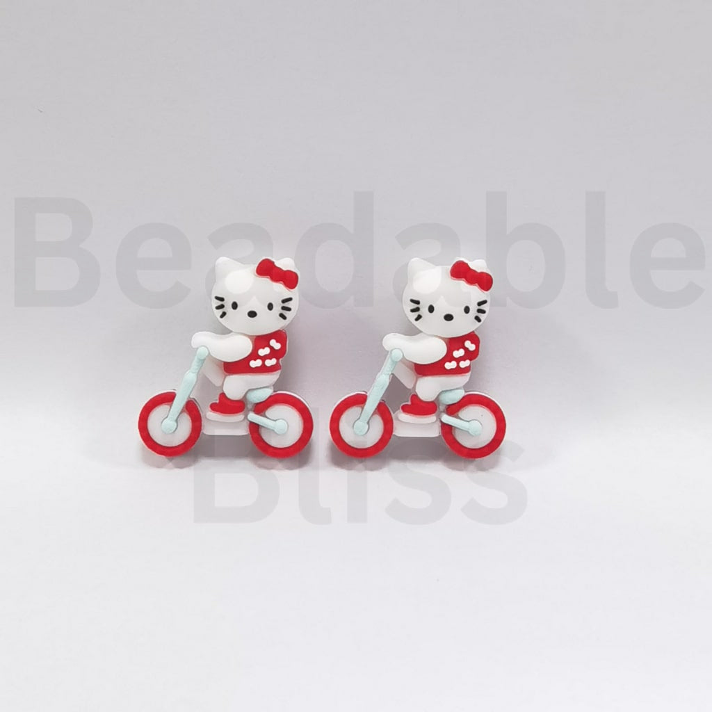 3D Cute HK Kitten Rides a Bike Bicycle Silicone Focal Beads