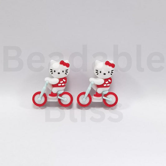 3D Cute HK Kitten Rides a Bike Bicycle Silicone Focal Beads