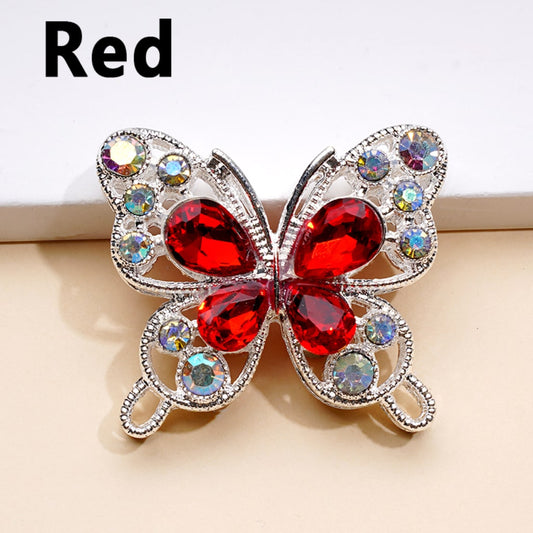 A collection of silver alloy butterfly-shaped beads adorned with multicolored water drop rhinestones in various colors.

