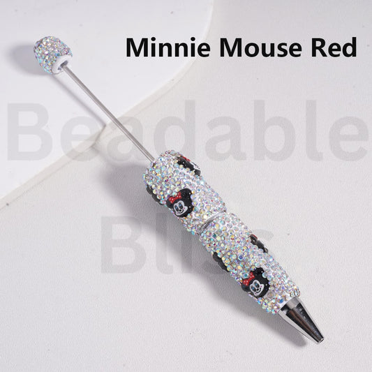 Decorative pen with rhinestone accents on a white background, branded 'beadablebliss.com'.

