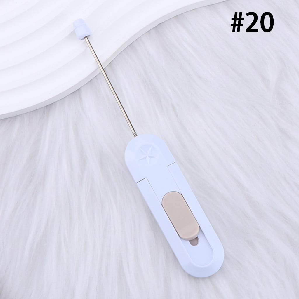 White handheld device with a metallic probe on a white background