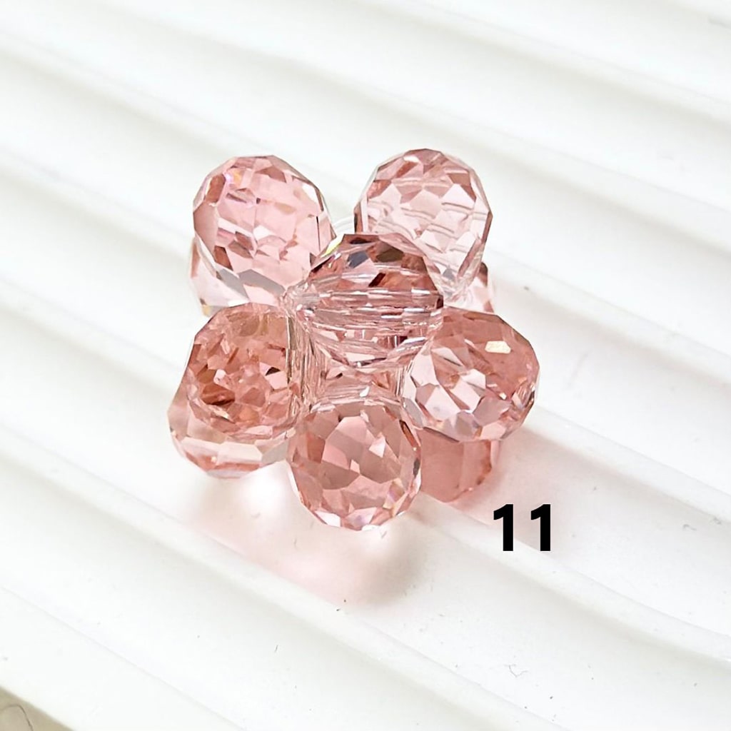 Pink crystal flower on a white background

