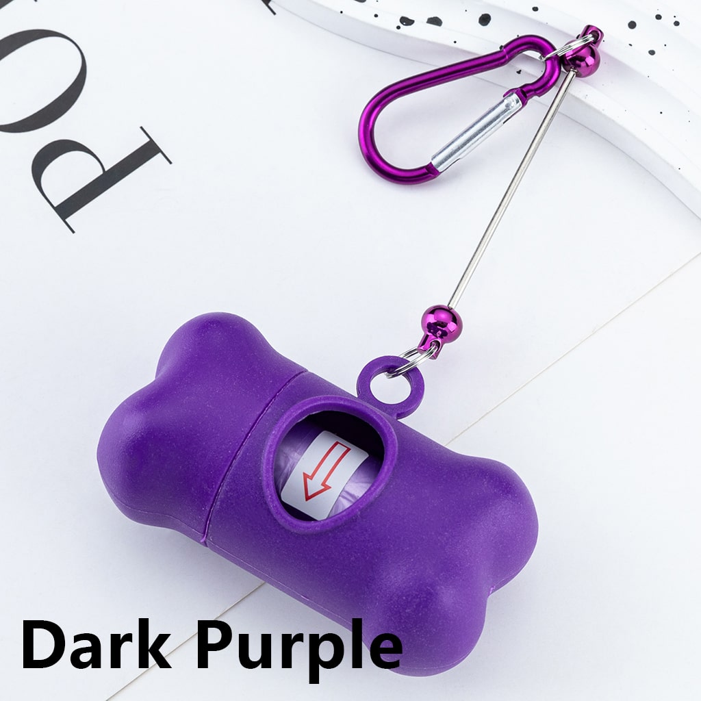 Purple dog bone-shaped treat dispenser with a carabiner on a white background