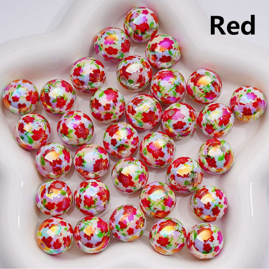 Colorful floral-patterned balls on a white surface with 'Red' text.

