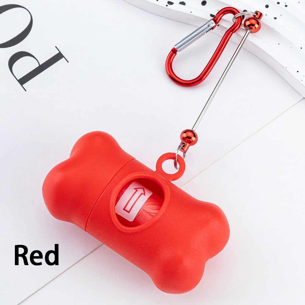 Red dog bone-shaped keychain with a carabiner on a white background