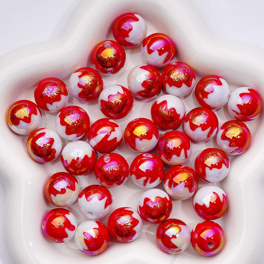 Red and white marbled beads in a white container

