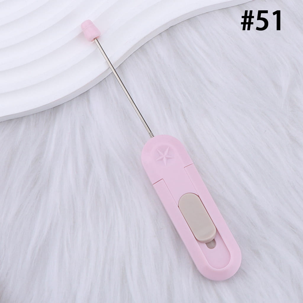 Pink handheld device with a long stick on a white background