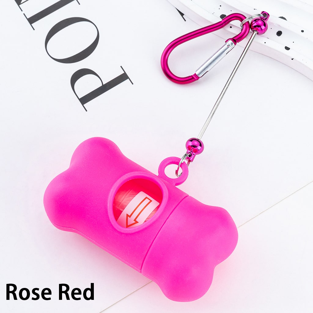 Pink dog bone-shaped product with a carabiner on a white background