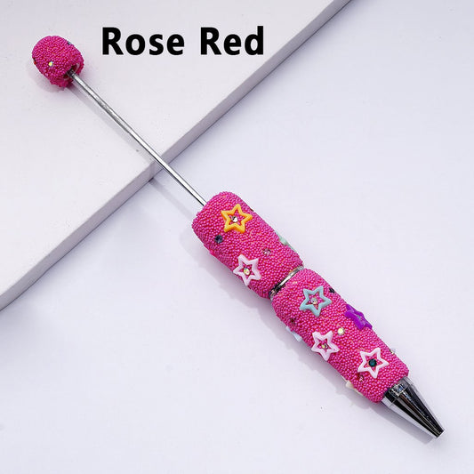 Pink textured pen with star designs on a white background, labeled 'Rose Red'.

