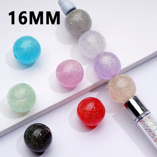 A collection of colorful, glossy round acrylic beads in various colors including blue, pink, purple, red, green, black, and silver, with a measurement marking of 16mm.

