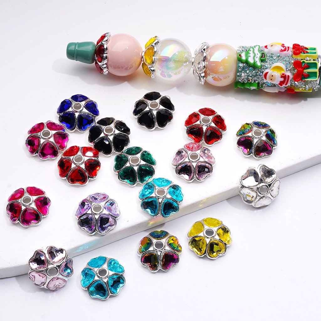 Colorful flower-shaped beads on a white background

