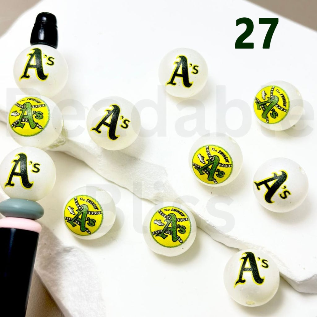 White earrings with 'A's' logo on a white background

