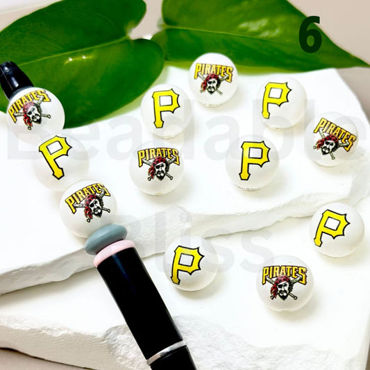 Set of earrings with Pittsburgh Pirates logo on a white background

