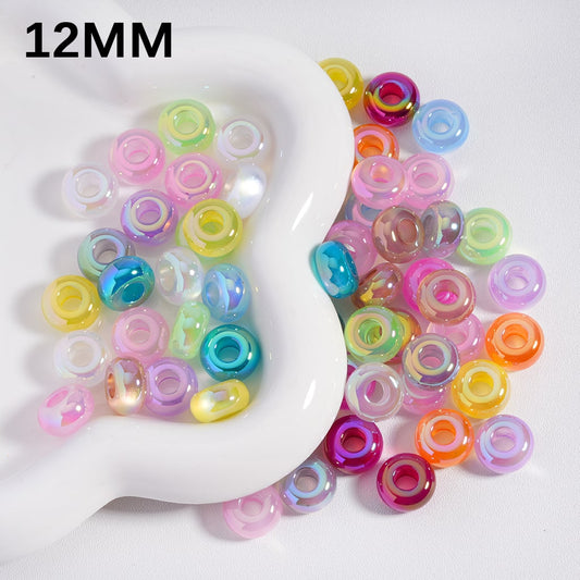 Colorful beads on a white dish with '12MM' text

