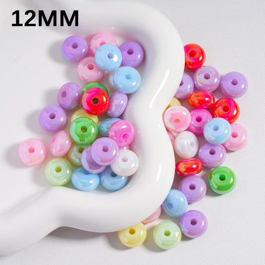 Assorted colorful beads on a white dish with '12MM' text.

