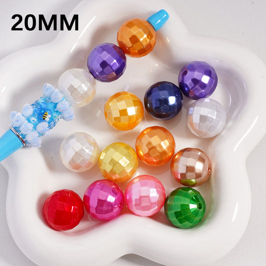 Colorful beads on a white tray with '20MM' text

