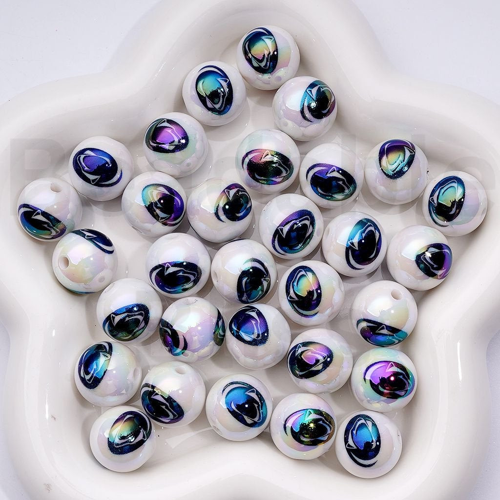 Iridescent glass beads on a white background

