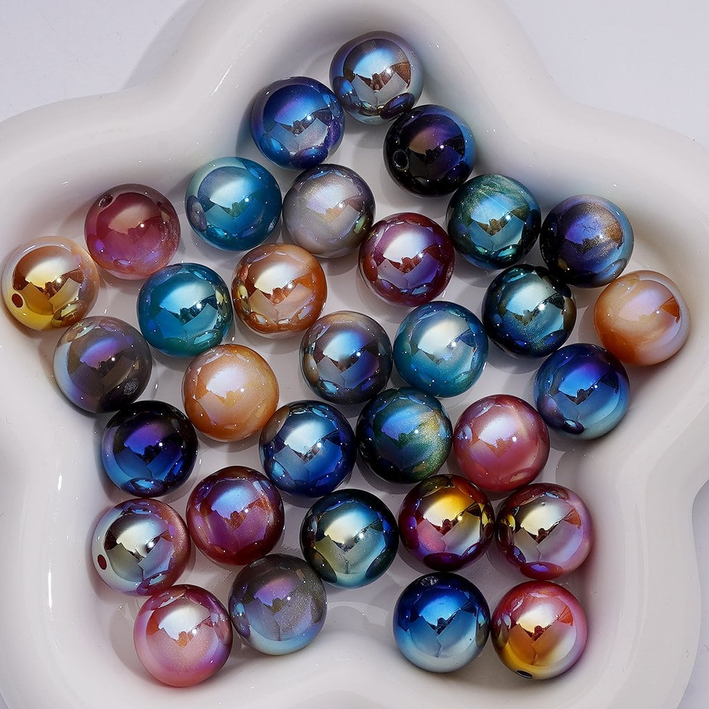 Multicolored marbles in a white bowl


