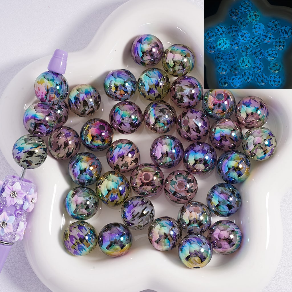 Multicolored beads on a white plate with '20MM' text

