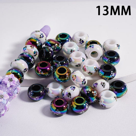 Assorted colorful beads on a white surface with '13 MM' text.


