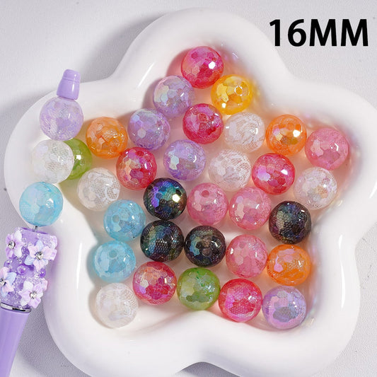 Colorful beads on a white tray with '16MM' text

