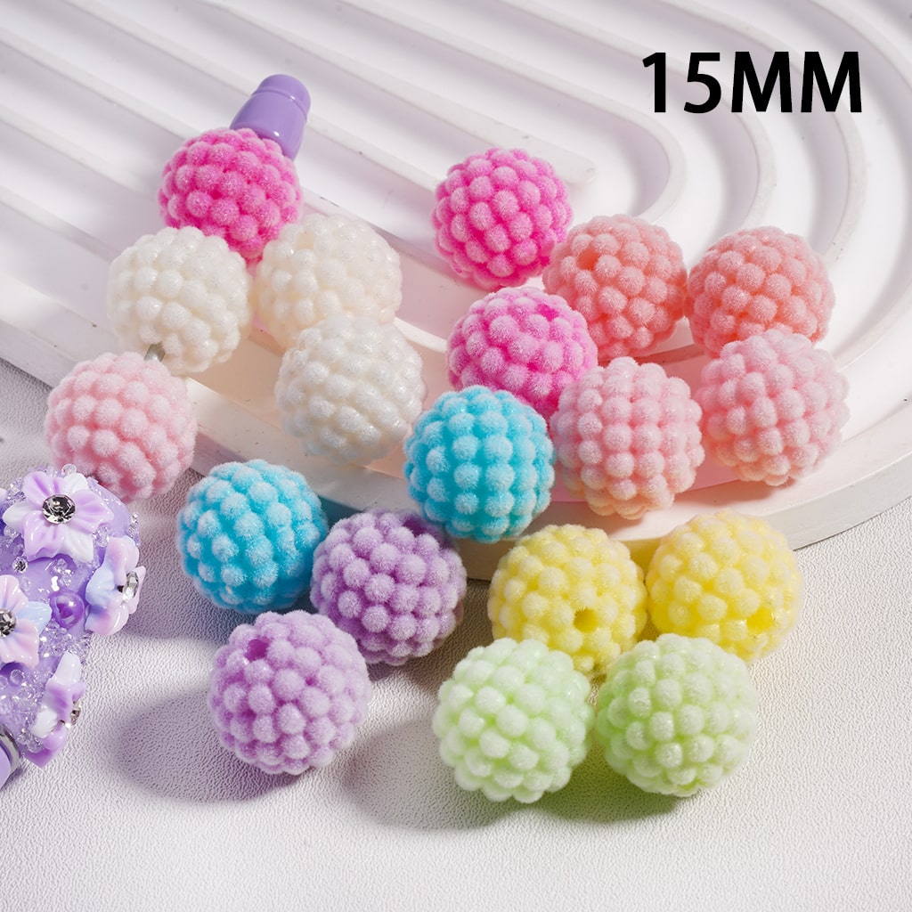 Colorful textured beads on a white surface with '15MM' text.

