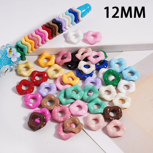 Colorful donut-shaped beads on a white background with '12MM' text.

