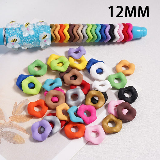Colorful donut-shaped beads with a spool of thread labeled '12MM' on a light background.

