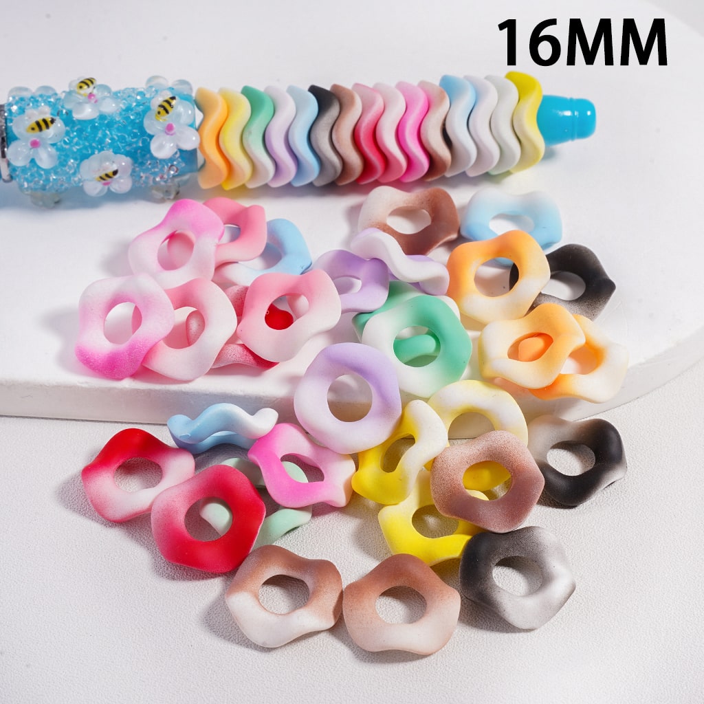 Assorted colorful rubber bands on a white background with '16MM' text.

