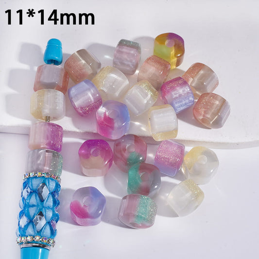 Colorful beads with a blue and green decorative element on a white background