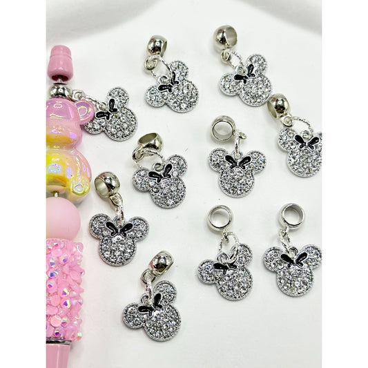 A collection of clear rhinestone charms shaped like mouse heads, intended to be used as pen dangles or embellishments.

