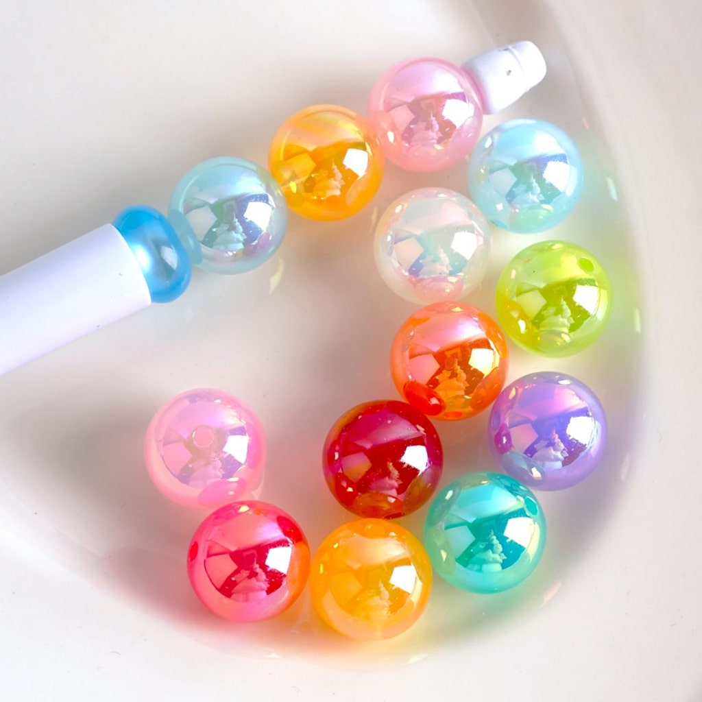 Colorful bubblegum beads on a white background

