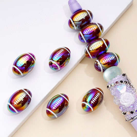 Colorful beaded hair tie with football designs on a white background

