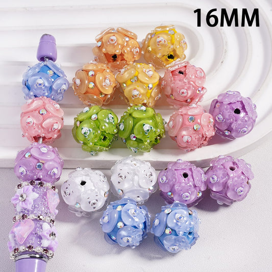 Colorful decorative beads with rhinestones on a white background, labeled '16MM'.