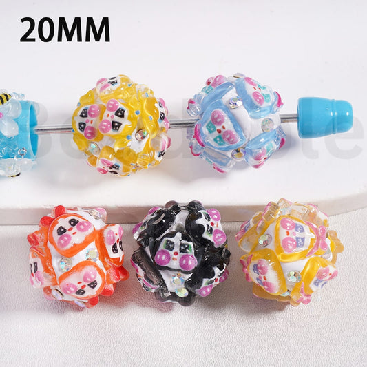 Colorful bead-style hair clips on a white background

