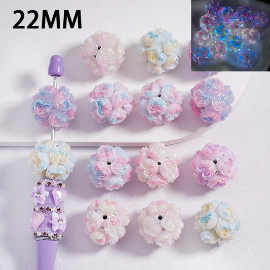Decorative flowers with a purple handle on a white background, showing close-up of flowers.

