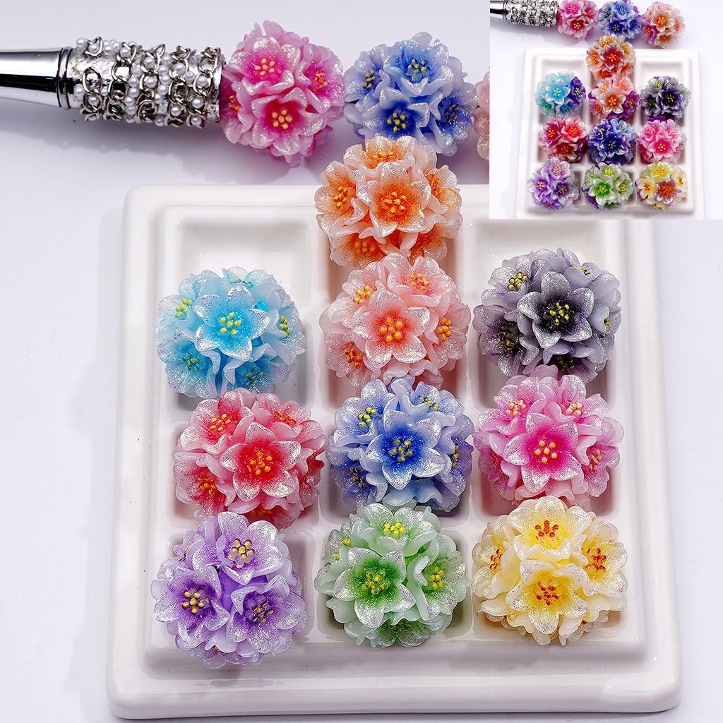 Colorful flower-shaped accessories on a white tray with a white background

