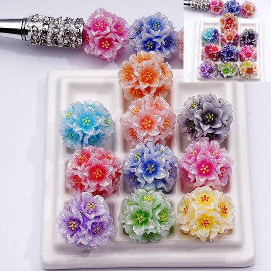 Colorful flower-shaped accessories on a white tray with a white background


