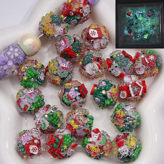 Colorful Christmas-themed beads on a white surface with a close-up inset showing a different texture.

