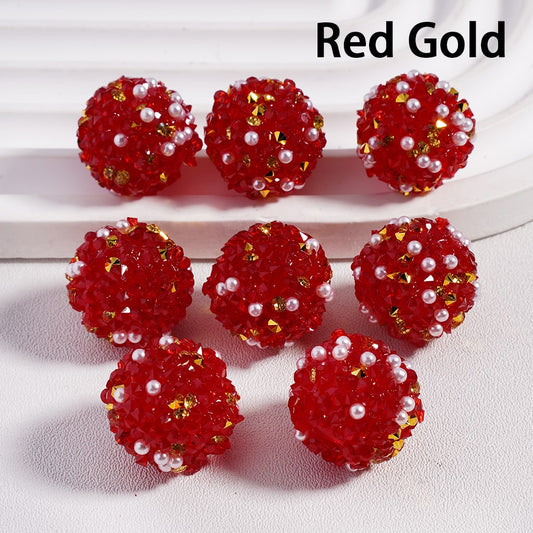 Red gold earrings with pearls on a white background

