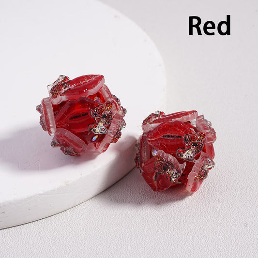 Red earrings on a white background with 'Red' text.

