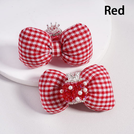Red and white checkered bows with decorative elements on a light gray background


