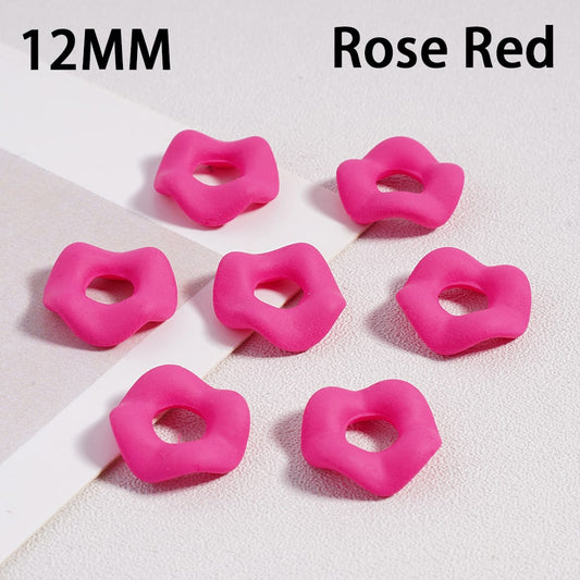Pink rubber bands labeled '12MM' and 'Rose Red' on a white background

