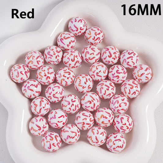 Red and white candy cane patterned balls on a white plate with '16MM' text.

