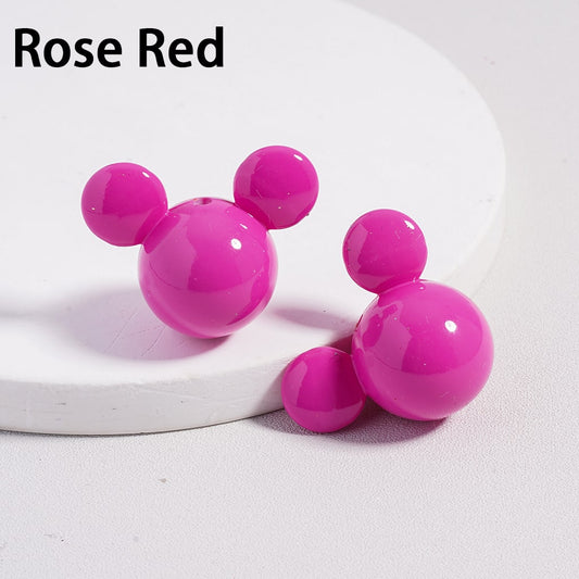 Rose red earrings on a white background with 'Rose Red' text above.

