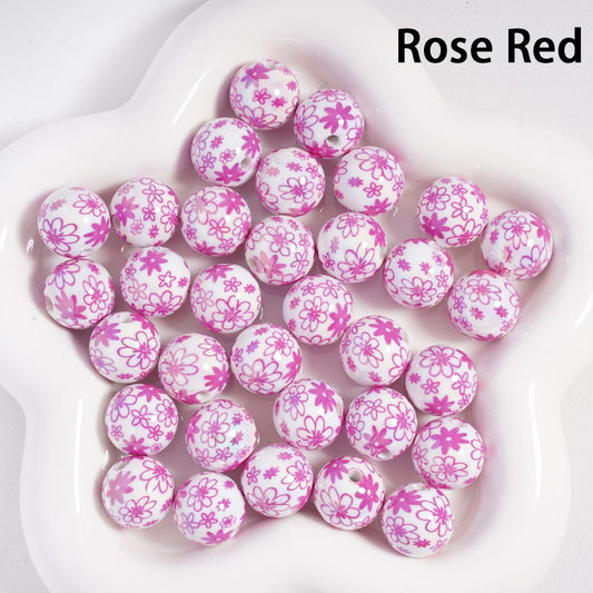 Pink floral beads on a white plate with 'Rose Red' text

