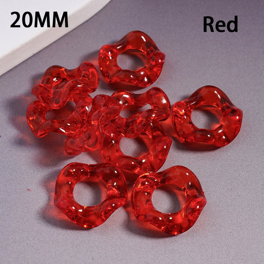 Red plastic rings on a gray surface with '20MM' and 'Red' text.

