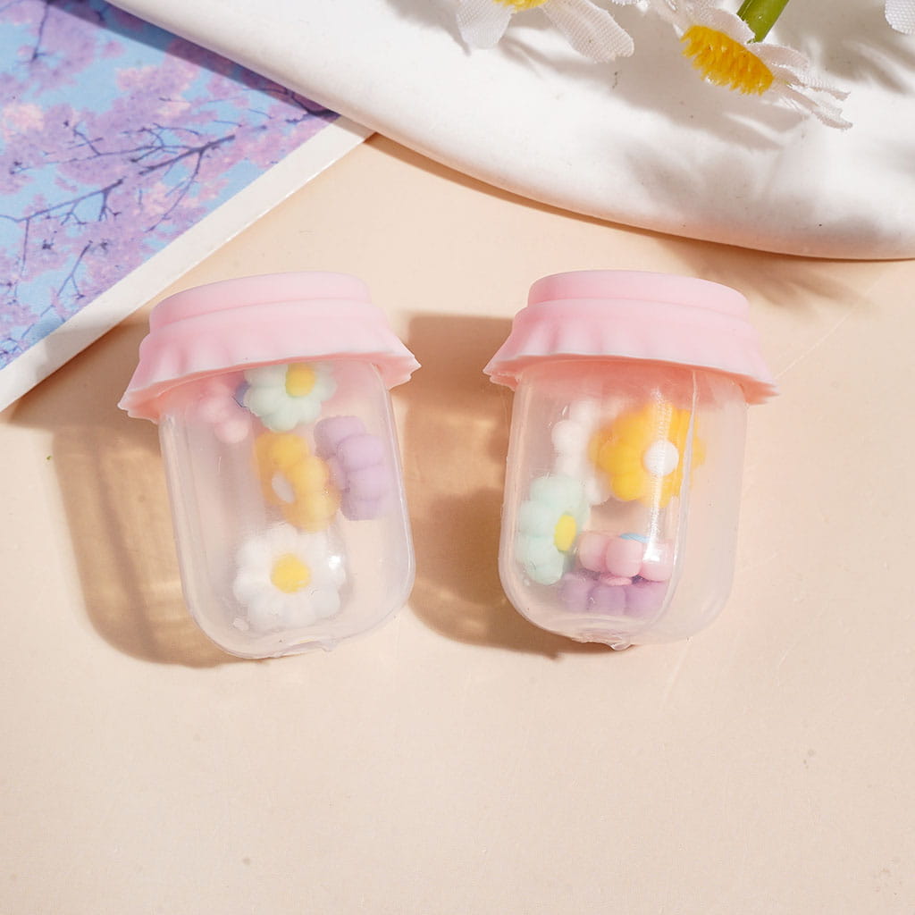 Clear Silicone Shaker Beads with Various Colored Lids and Flowers Embedded Inside the Bottle, Height 27MM