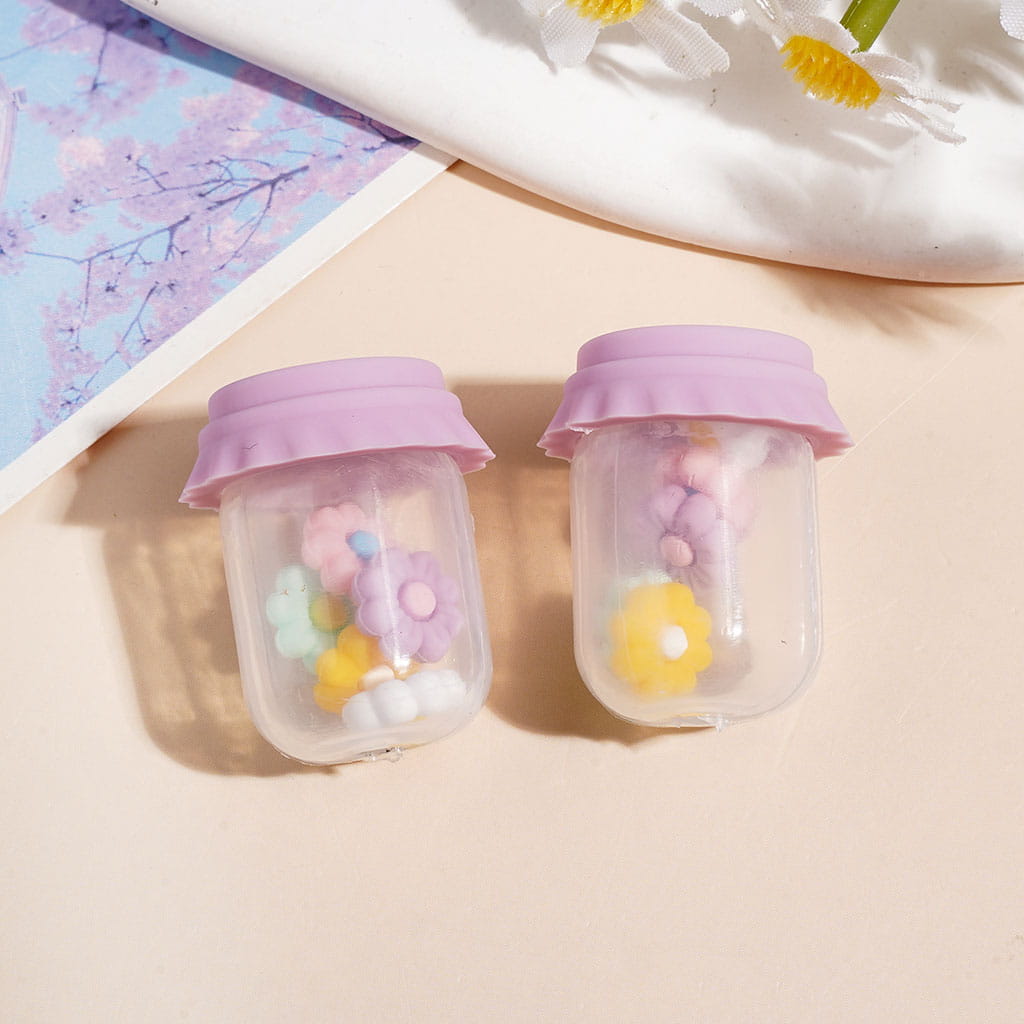 Clear Silicone Shaker Beads with Various Colored Lids and Flowers Embedded Inside the Bottle, Height 27MM